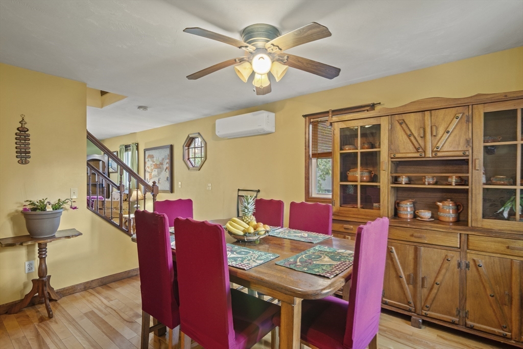 4 Wilson Way Rutland, MA 01543 - Photo 8 of 32 a view of a dining room with furniture and a chandelier