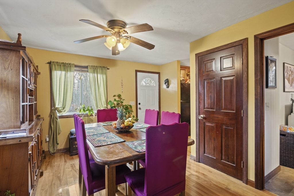 4 Wilson Way Rutland, MA 01543 - Photo 9 of 32 a view of a dining room with furniture and a chandelier