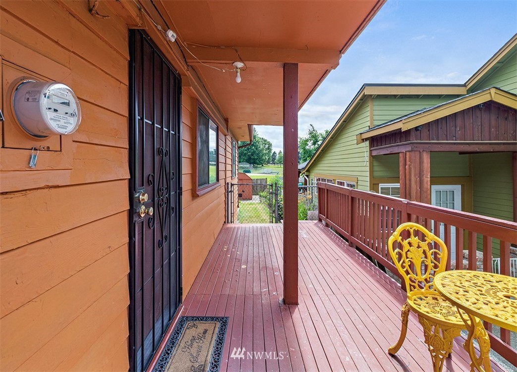 2619 Northeast 9th Street Renton, WA 98056 - Photo 3 of 25 a balcony with wooden floor