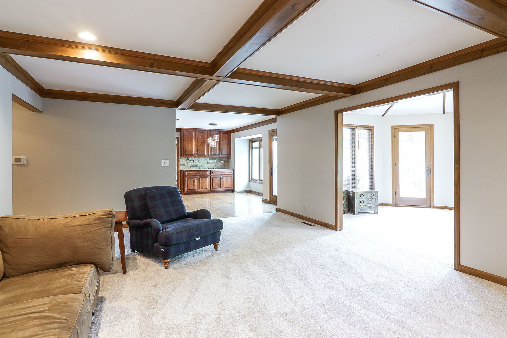 841 Turnbridge Circle Naperville, IL 60540 - Photo 13 of 39 a living room with furniture and a window