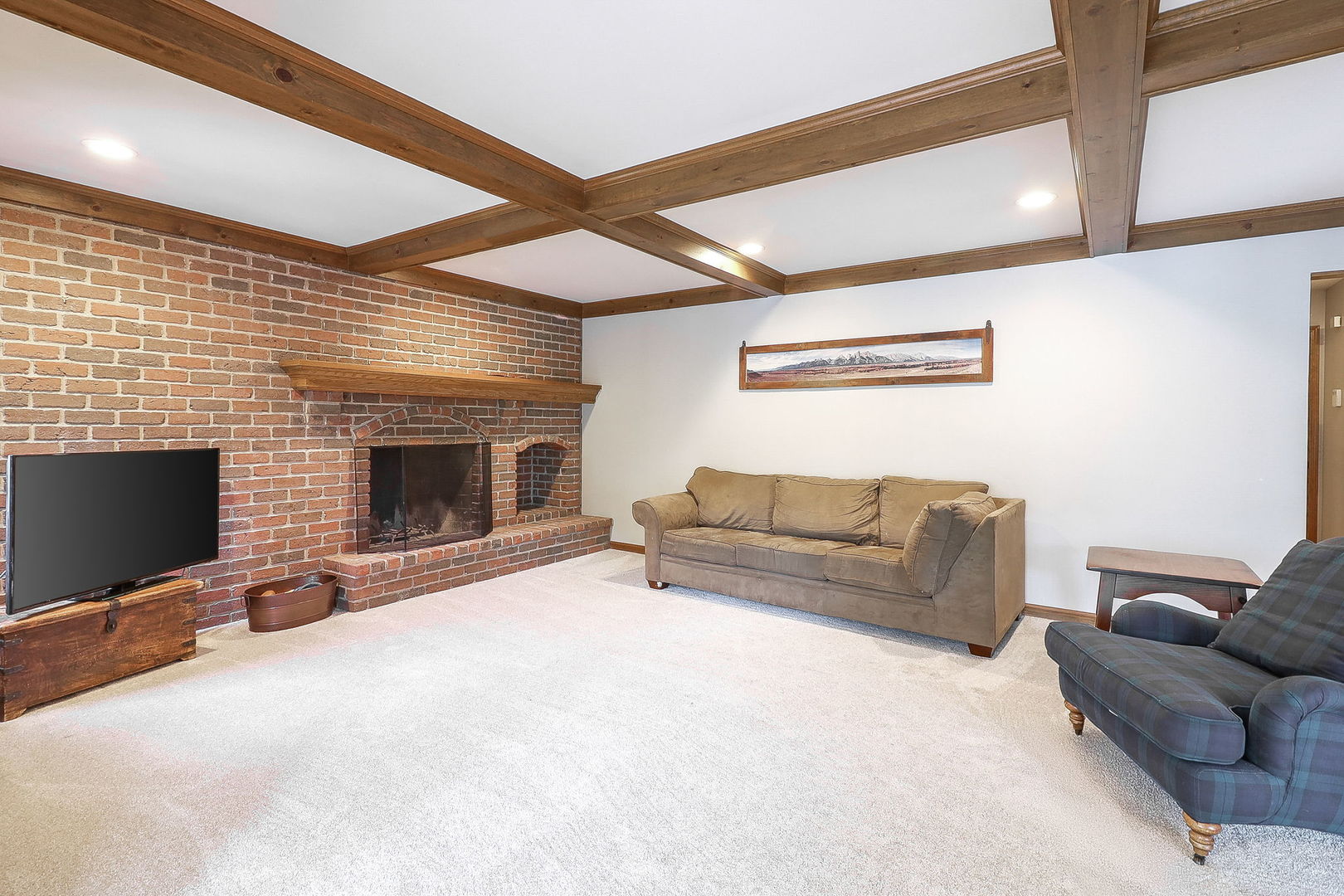 841 Turnbridge Circle Naperville, IL 60540 - Photo 14 of 39 a living room with furniture flat screen tv and a fireplace