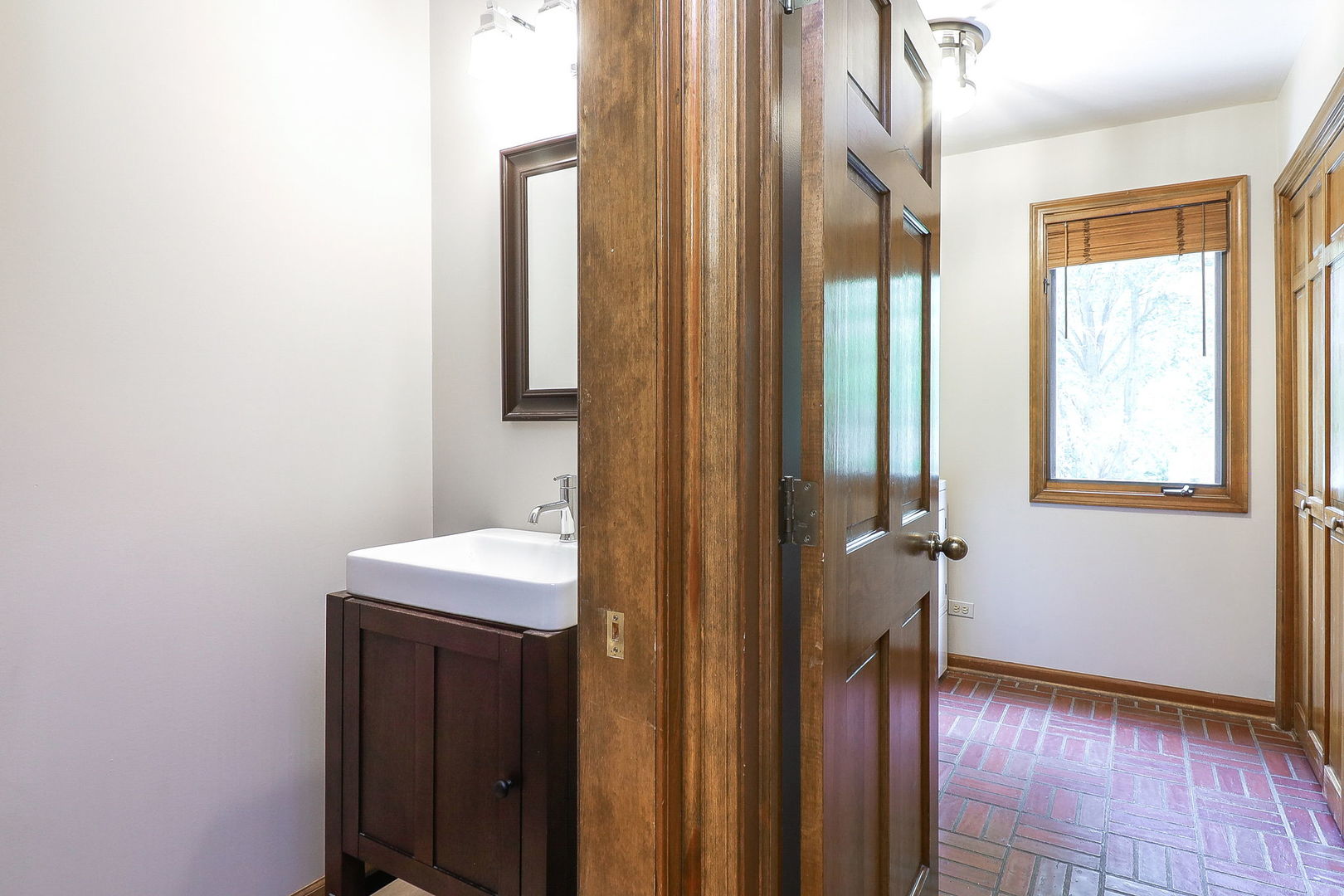 841 Turnbridge Circle Naperville, IL 60540 - Photo 17 of 39 a bathroom with a sink a mirror and a shower