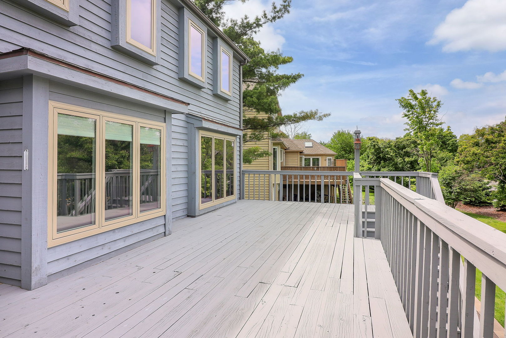 841 Turnbridge Circle Naperville, IL 60540 - Photo 30 of 39 a view of a house with a wooden deck