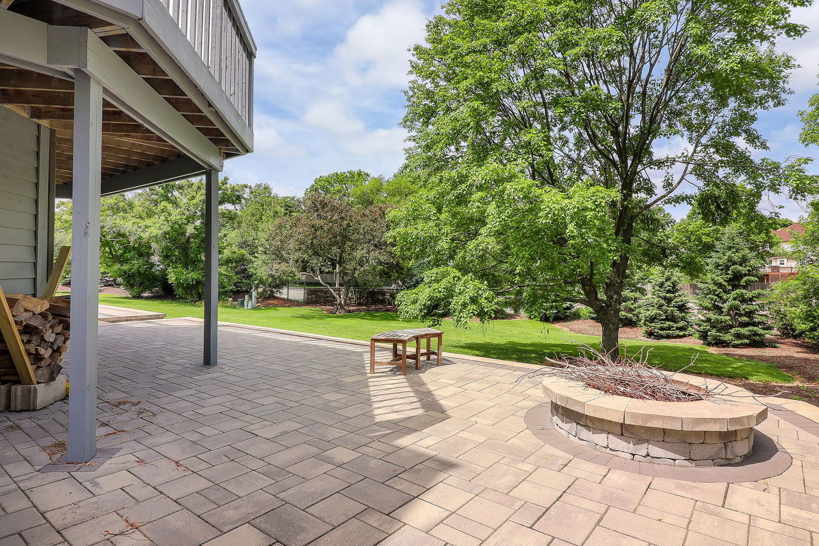 841 Turnbridge Circle Naperville, IL 60540 - Photo 32 of 39 a view of a bench in a yard