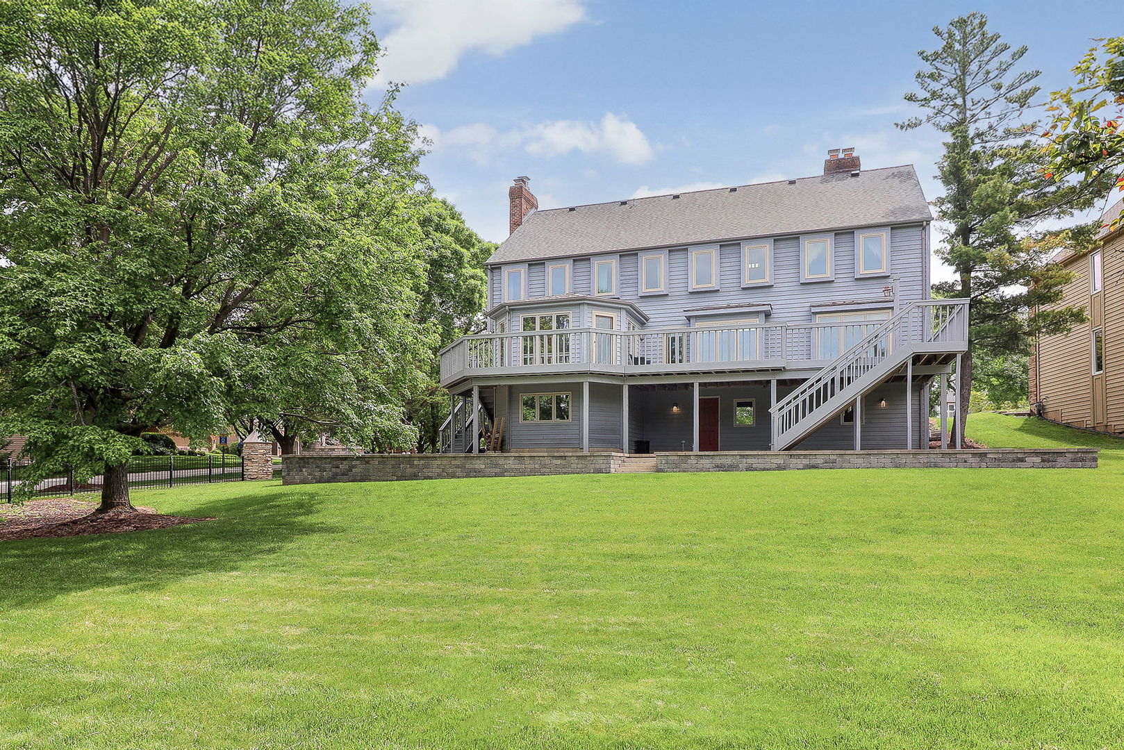 841 Turnbridge Circle Naperville, IL 60540 - Photo 35 of 39 a view of a house with a big yard and large trees