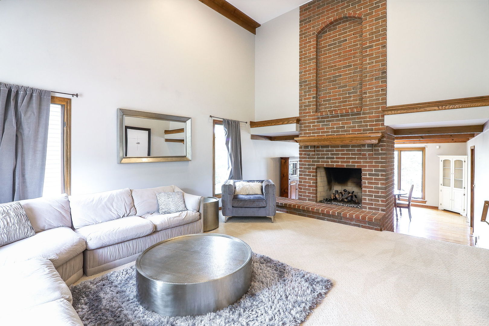841 Turnbridge Circle Naperville, IL 60540 - Photo 5 of 39 a living room with furniture and a fireplace