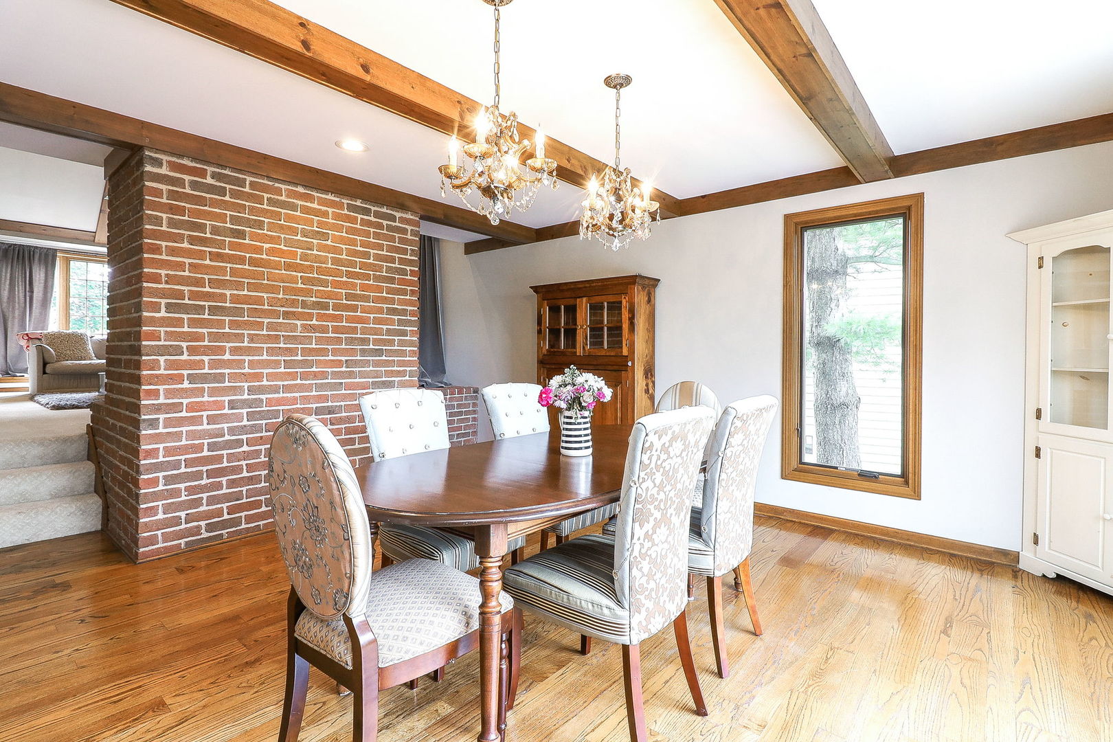 841 Turnbridge Circle Naperville, IL 60540 - Photo 6 of 39 a view of a dining room with furniture and chandelier