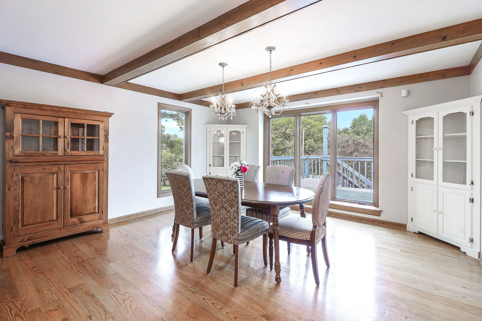 841 Turnbridge Circle Naperville, IL 60540 - Photo 7 of 39 a view of a dining room with furniture window and wooden floor