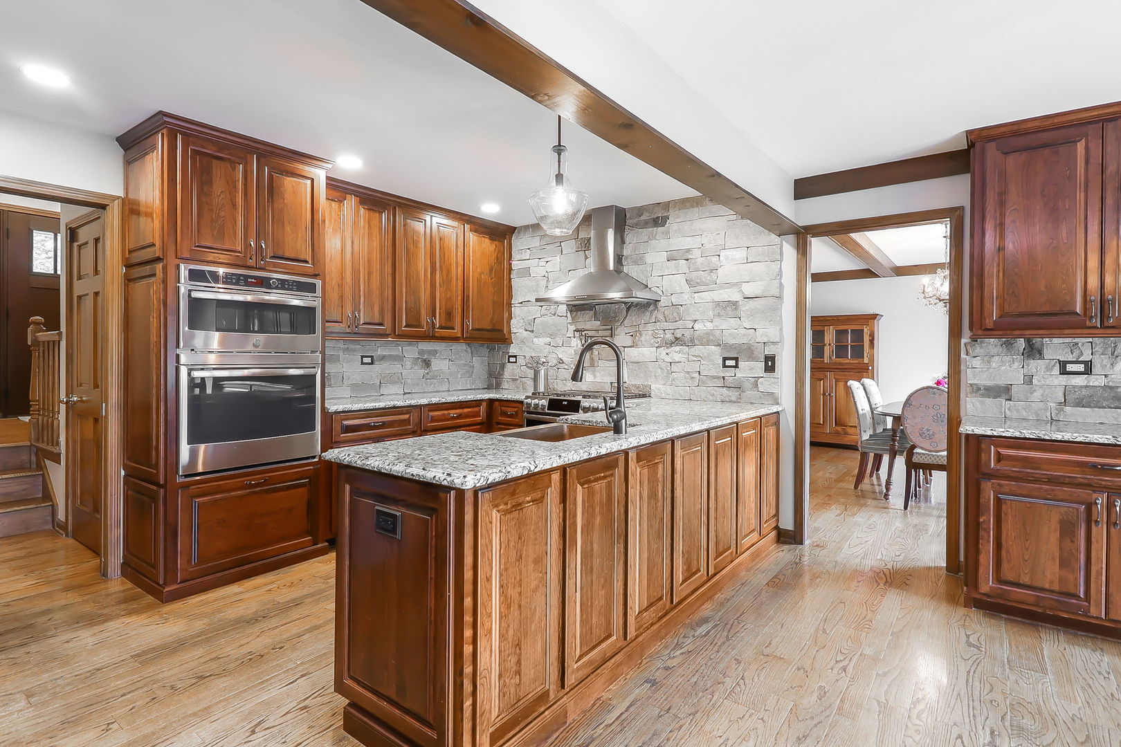 841 Turnbridge Circle Naperville, IL 60540 - Photo 8 of 39 a kitchen with stainless steel appliances granite countertop a sink stove and refrigerator