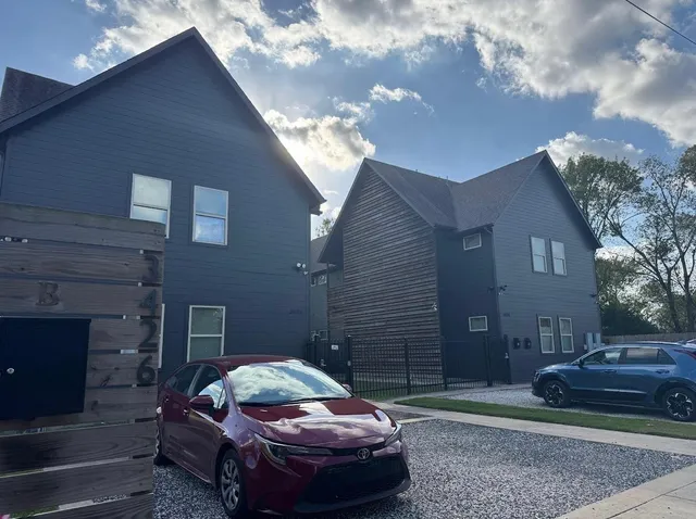 a front view of a house with parking