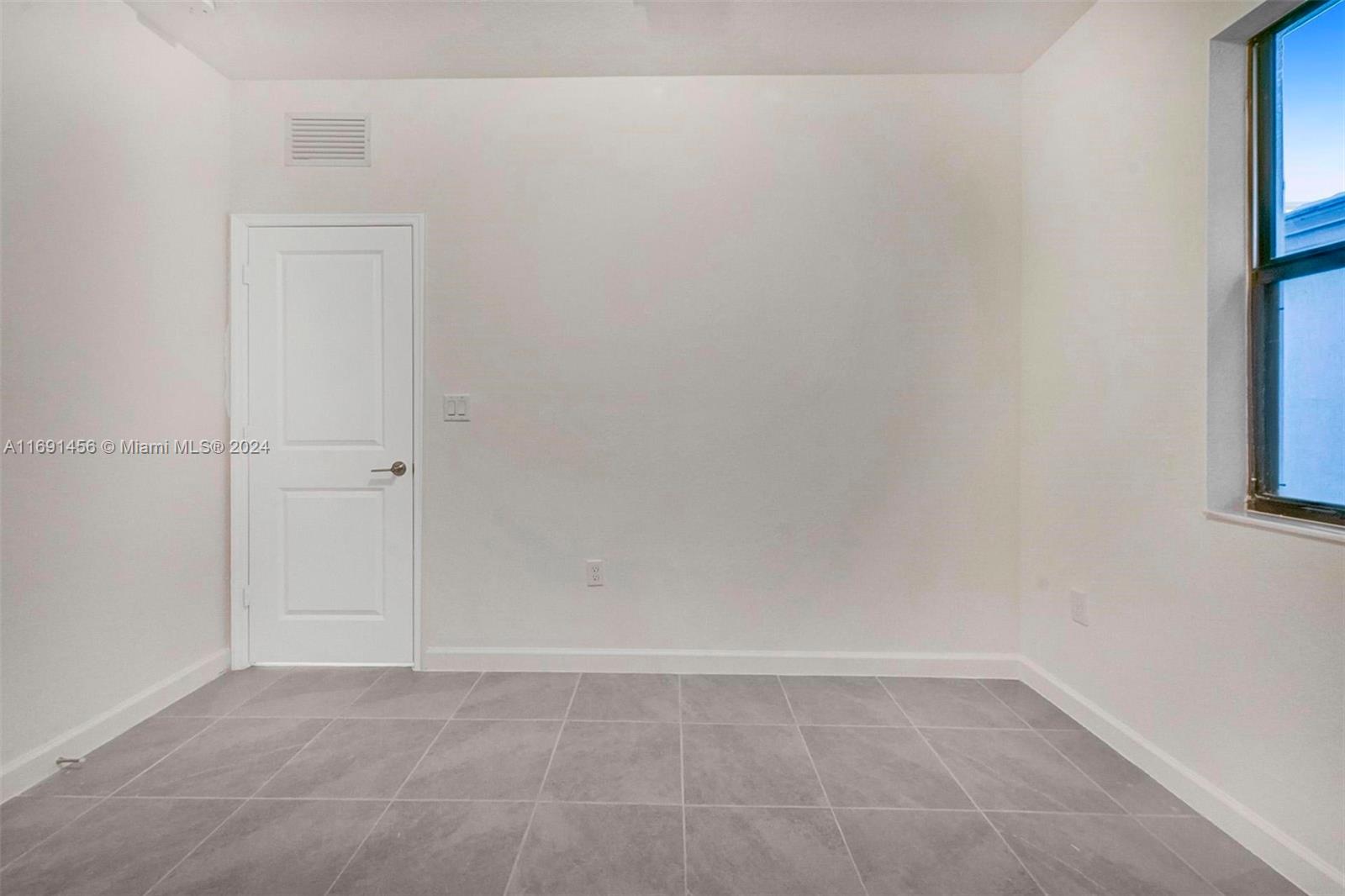 13405 Southwest 285th Street, Unit 13405 Homestead, FL 33033 - Photo 23 of 59 a view of an empty room