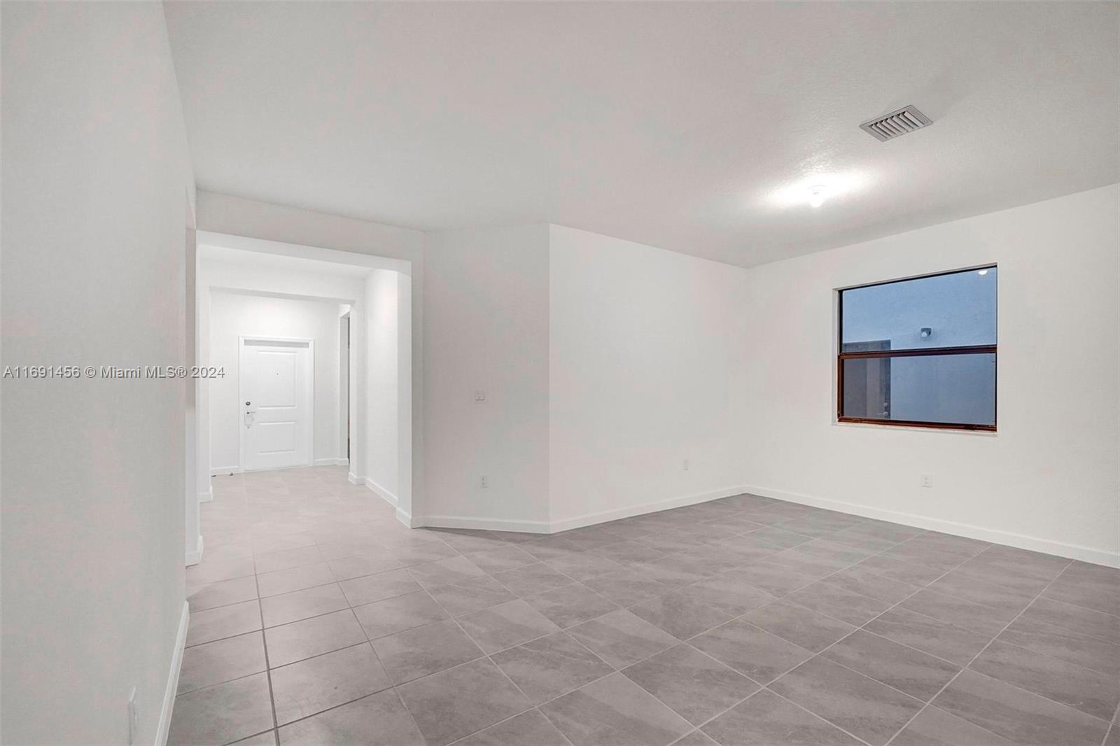 13405 Southwest 285th Street, Unit 13405 Homestead, FL 33033 - Photo 31 of 59 a view of an empty room