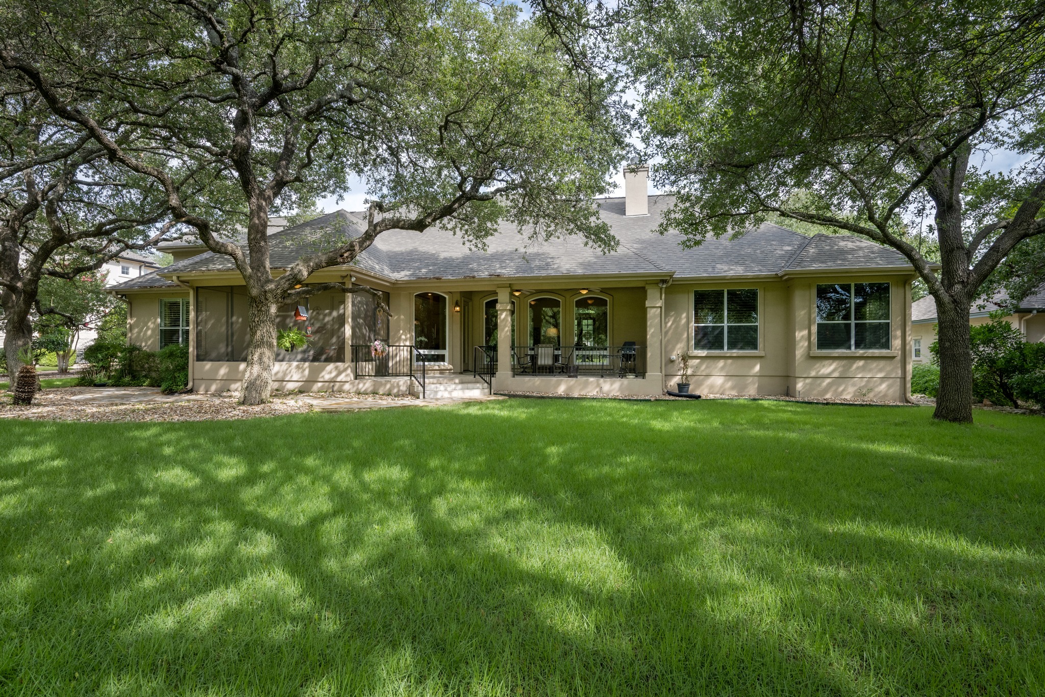 29 Meadows End Georgetown, TX 78628 - Photo 31 of 38 a front view of a house with a yard table and chairs