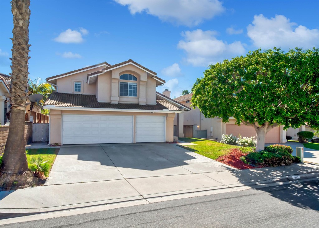 1593 Dawson Drive Vista, CA 92081 - Photo 1 of 40 a front view of a house with garden