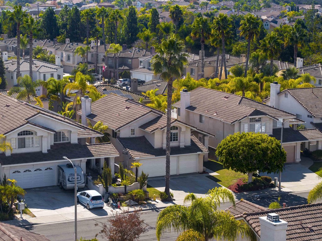 1593 Dawson Drive Vista, CA 92081 - Photo 2 of 40 a aerial view of a house with swimming pool and garden