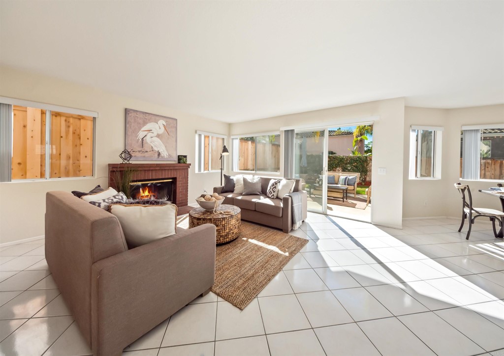 1593 Dawson Drive Vista, CA 92081 - Photo 11 of 40 a living room with furniture and a fireplace