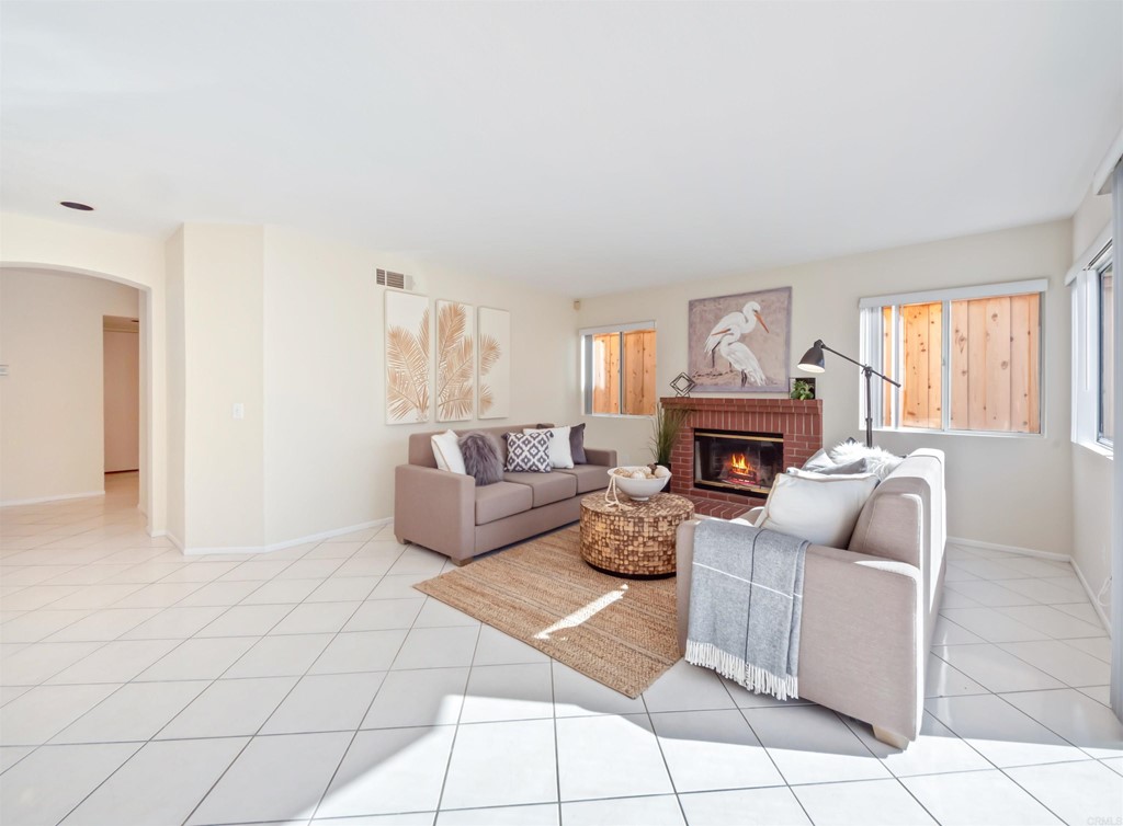 1593 Dawson Drive Vista, CA 92081 - Photo 12 of 40 a living room with furniture and a fireplace