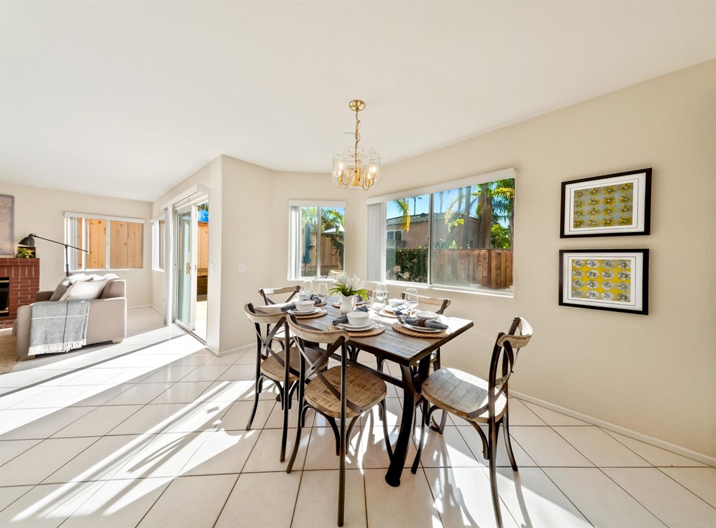 1593 Dawson Drive Vista, CA 92081 - Photo 14 of 40 a view of a dining room with furniture and chandelier