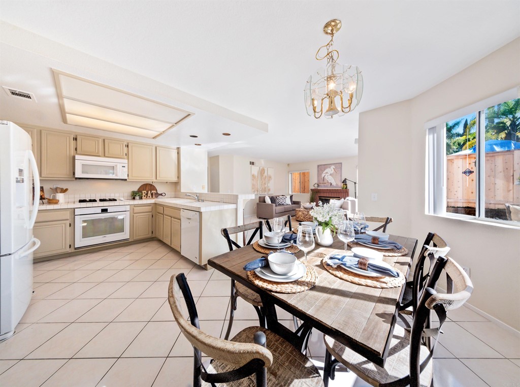 1593 Dawson Drive Vista, CA 92081 - Photo 15 of 40 a view of a dining room with furniture