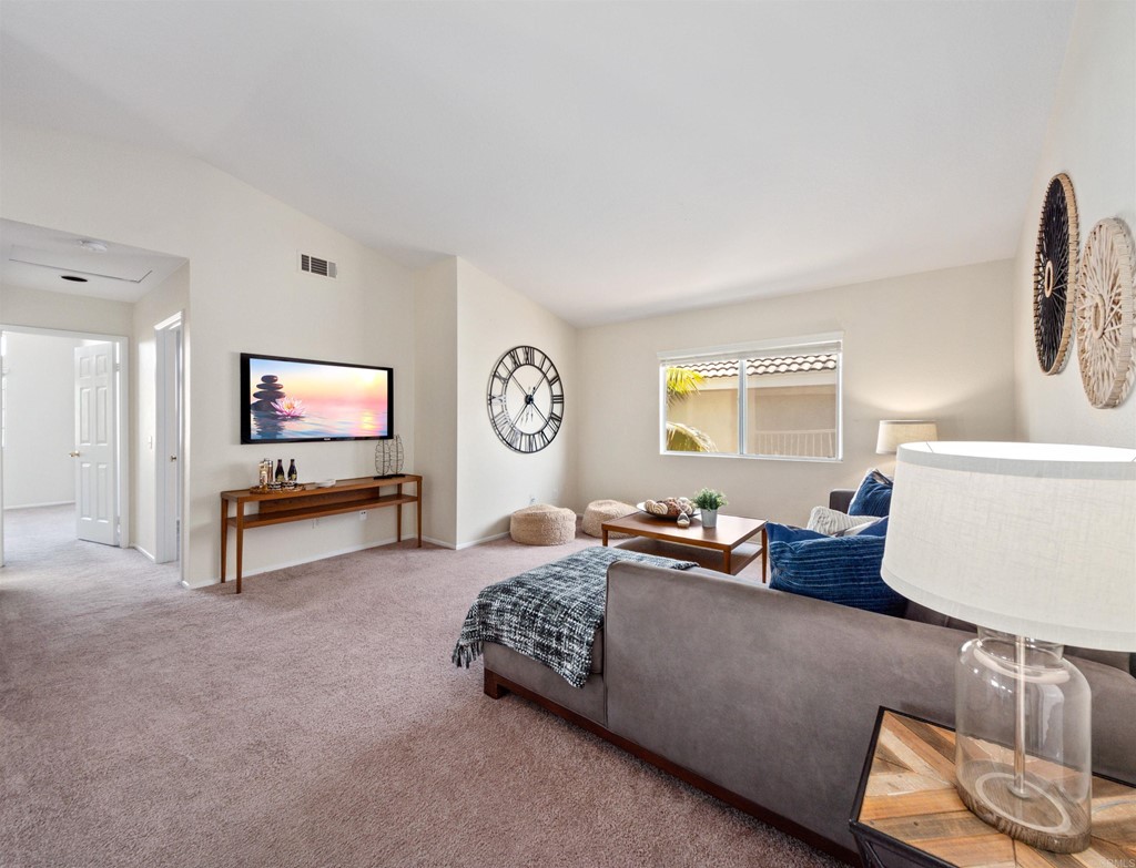 1593 Dawson Drive Vista, CA 92081 - Photo 22 of 40 a living room with furniture and a flat screen tv