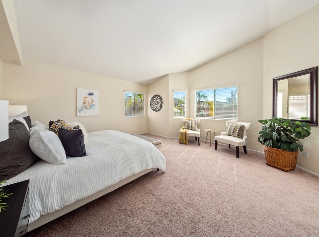 1593 Dawson Drive Vista, CA 92081 - Photo 25 of 40 a bedroom with bed and balcony with window