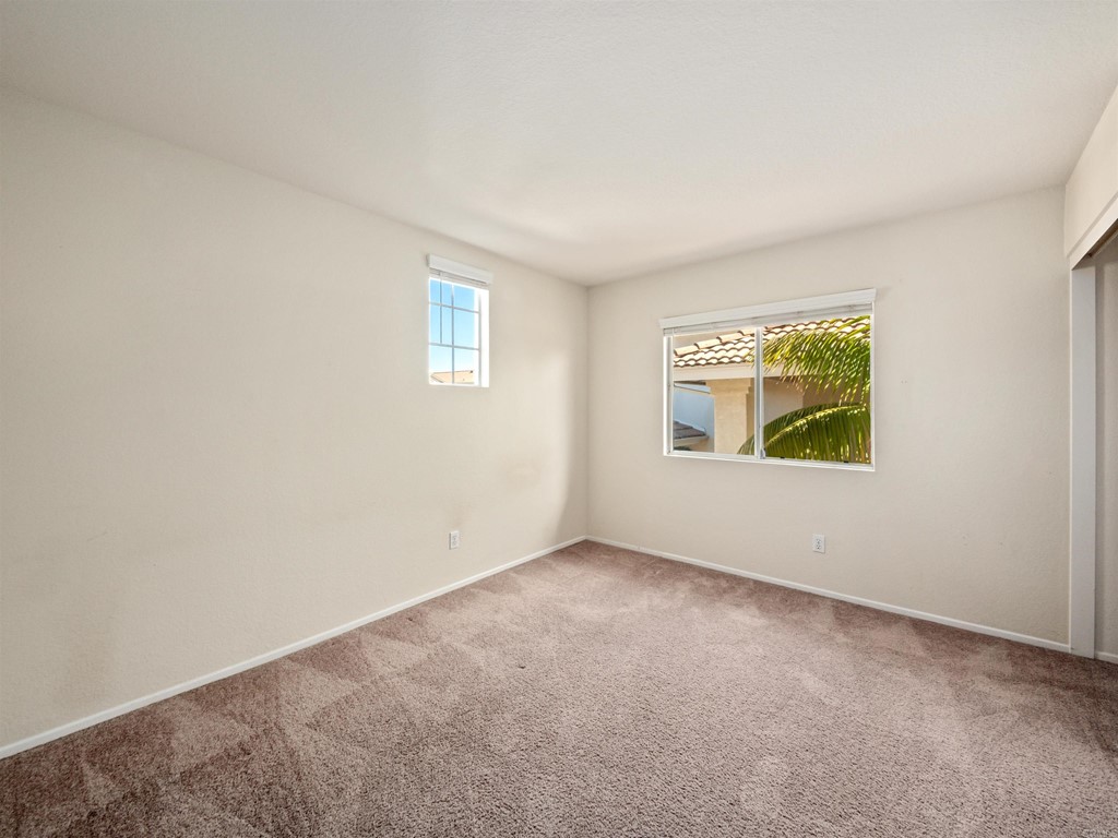 1593 Dawson Drive Vista, CA 92081 - Photo 31 of 40 an empty room with windows