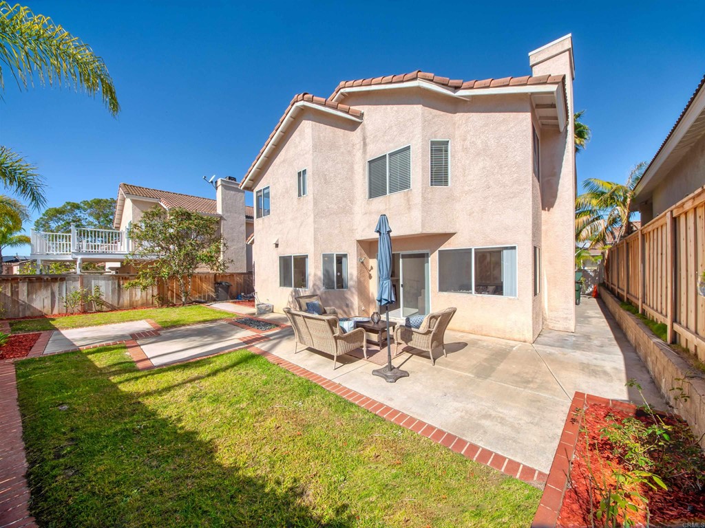1593 Dawson Drive Vista, CA 92081 - Photo 39 of 40 a view of a backyard with swimming pool and sitting area
