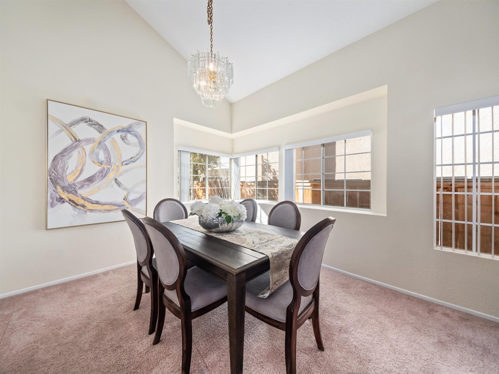 1593 Dawson Drive Vista, CA 92081 - Photo 9 of 40 a view of a dining room that has a table and chairs