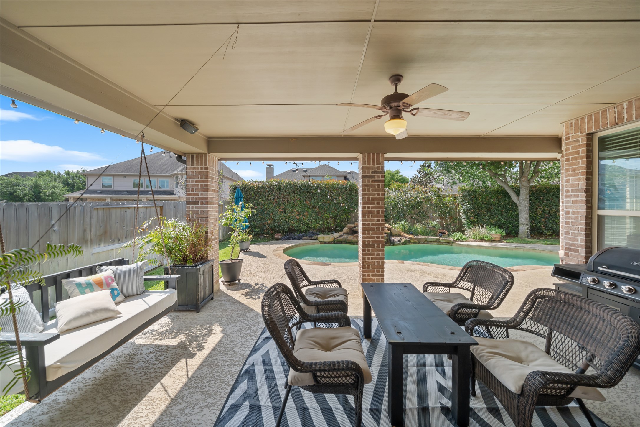 17707 Retreat Ridge Lane Houston, TX 77095 - Photo 29 of 32 Covered for watching TV, entertaining by the pool