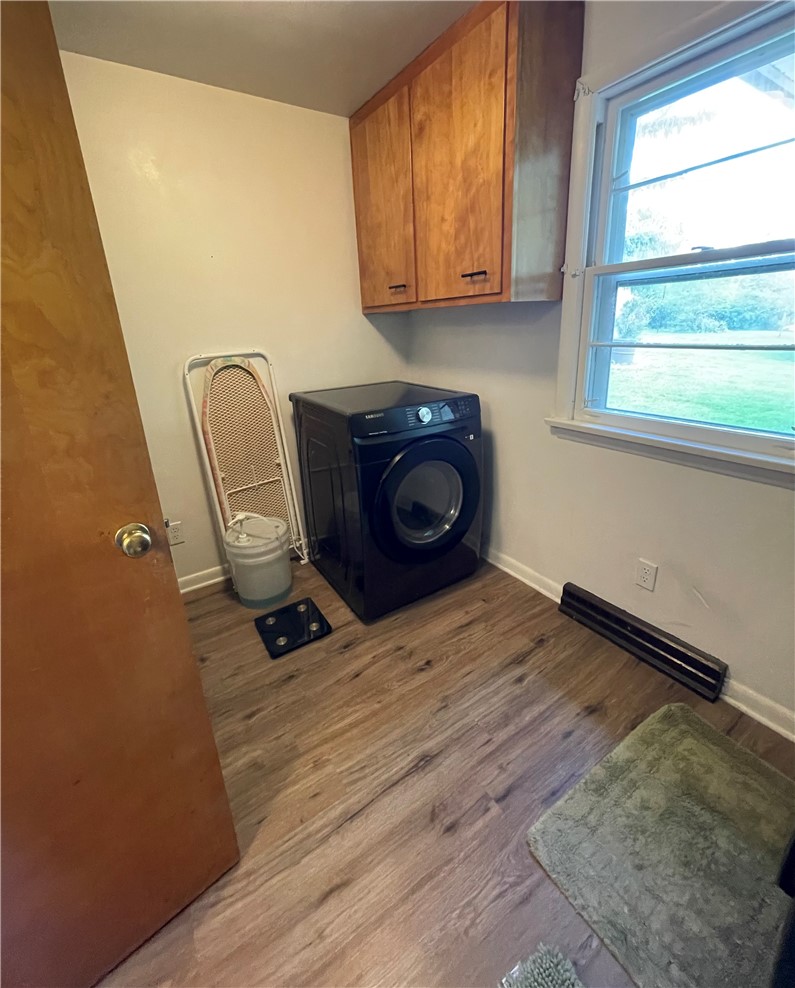 360 Ridge Street Piqua, OH 45356 - Photo 16 of 46 This functional laundry area features ample cabinetry and natural light, optimizing daily routines.