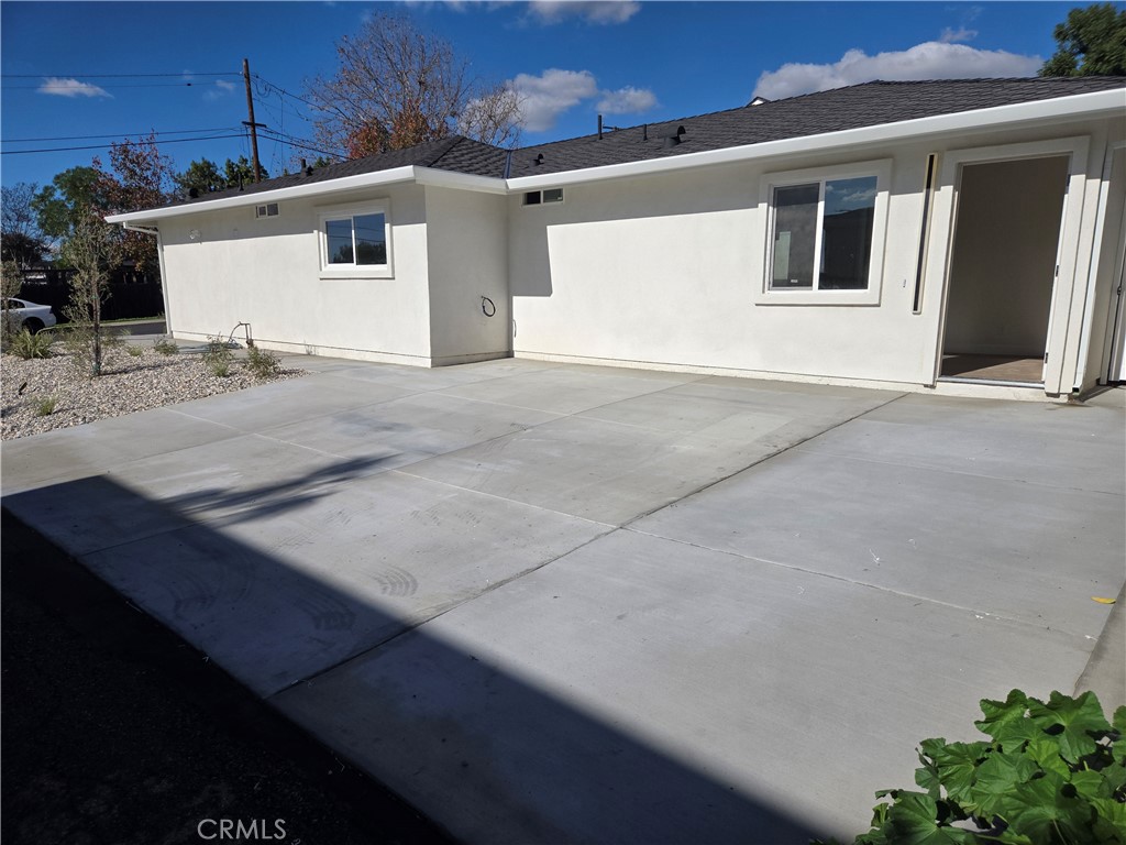 a view of garage and yard
