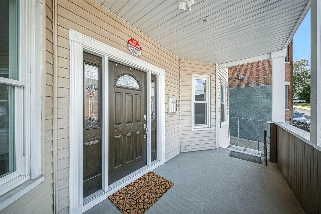155 Wellington Hill Street, Unit 3 Boston, MA 02126 - Photo 19 of 20 a view of an entryway door