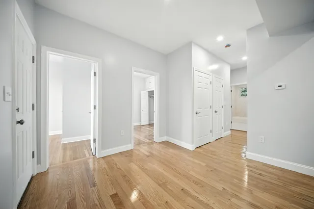 a view of entryway with wooden floor