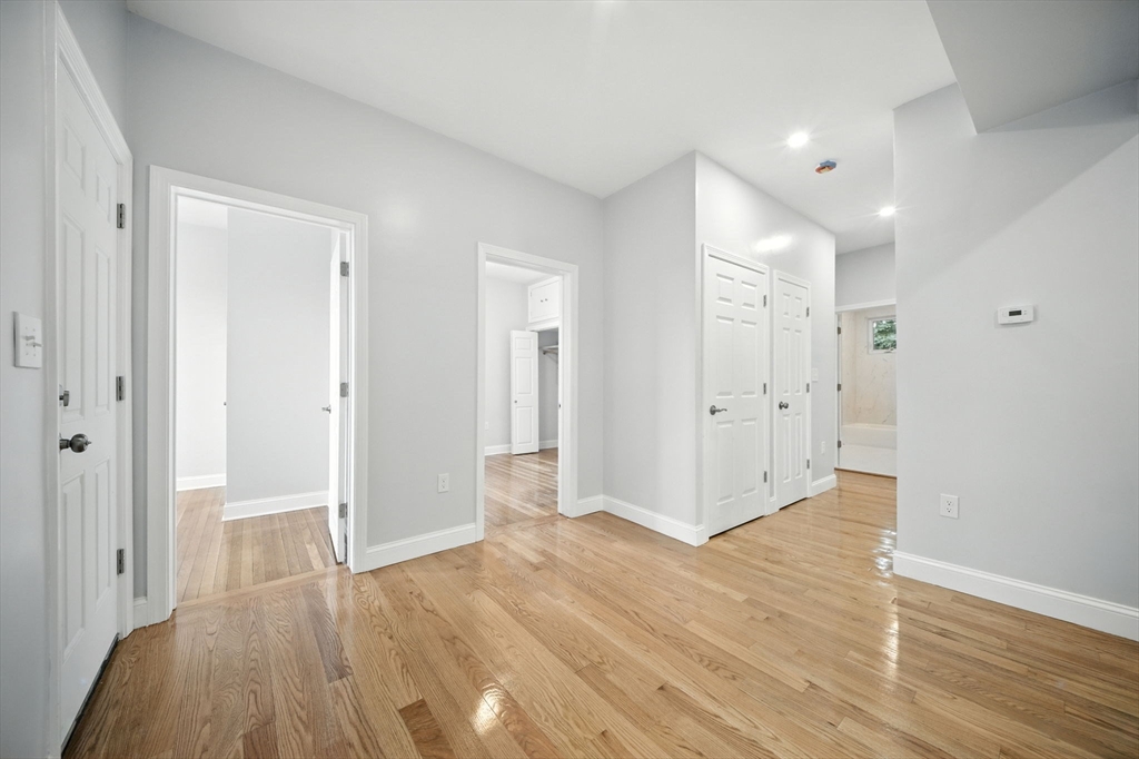 155 Wellington Hill Street, Unit 3 Boston, MA 02126 - Photo 8 of 20 a view of entryway with wooden floor