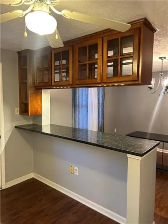 a view of a living room with entryway
