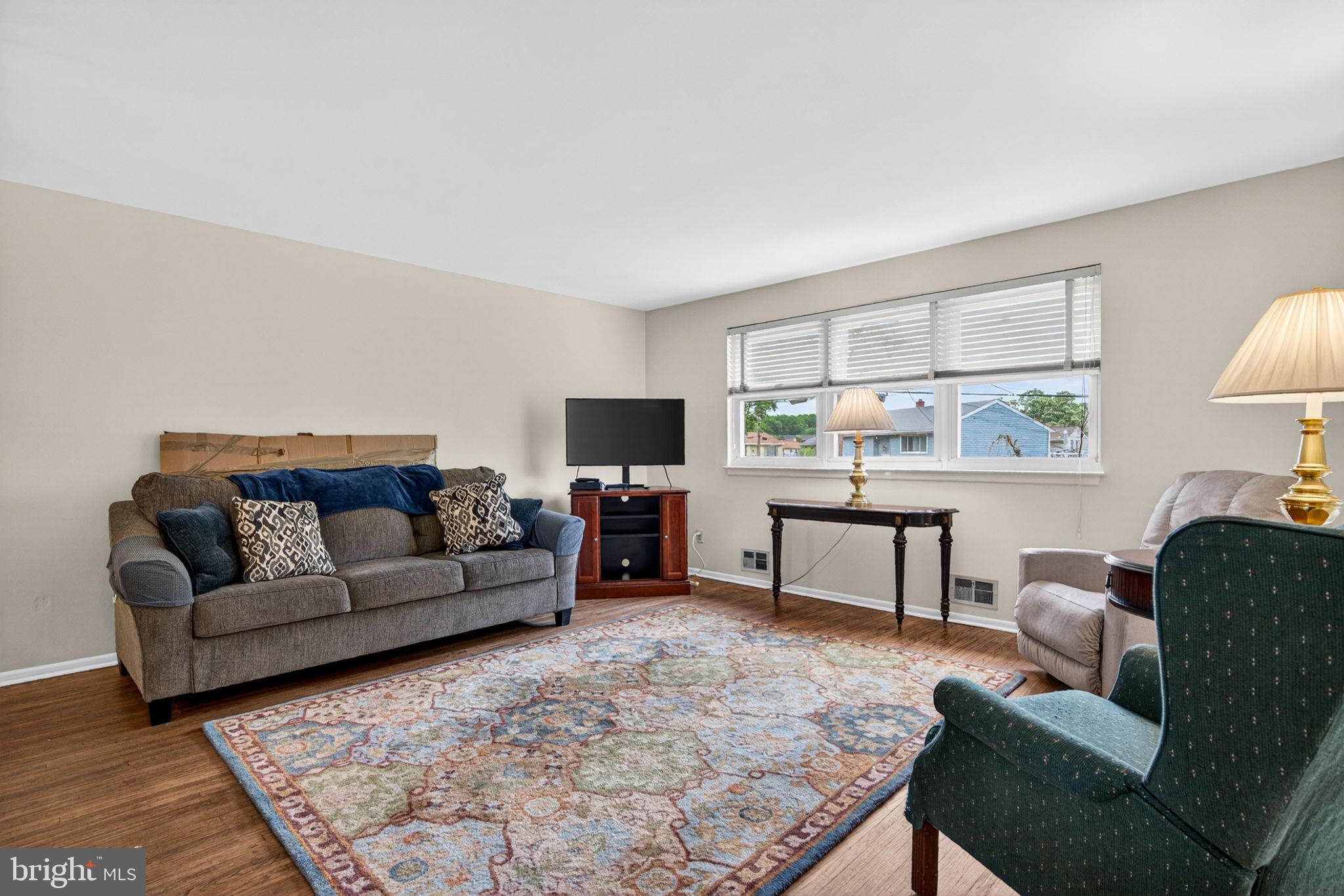 46 Trinity Avenue Marlton, NJ 08053 - Photo 5 of 37 a living room with furniture and a rug