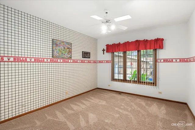 a view of a bedroom with window
