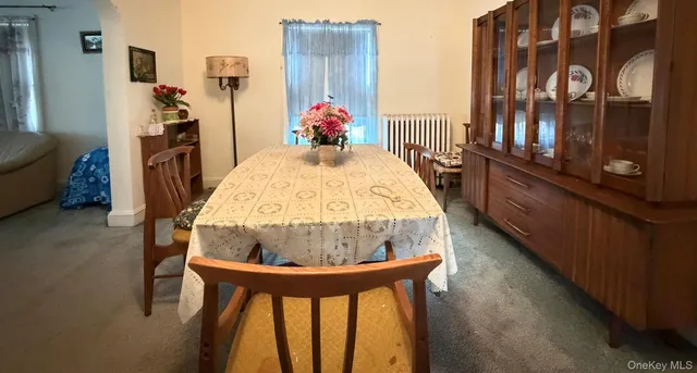 a view of a living room and bathroom