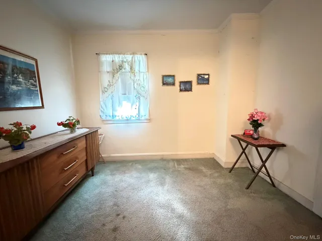 a view of workspace with furniture and window