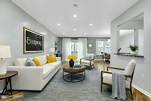a view of kitchen with sink and refrigerator