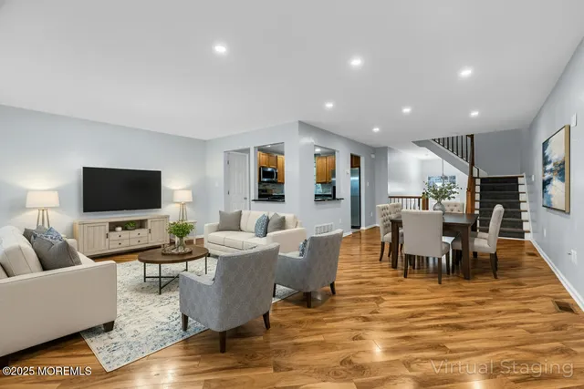 a dining room with furniture and window