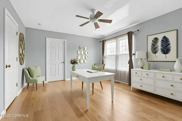 a room with a bed and a chandelier