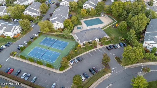 a view of an outdoor space and tennis court