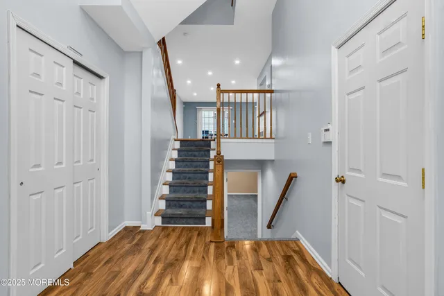 a view of entryway with wooden floor