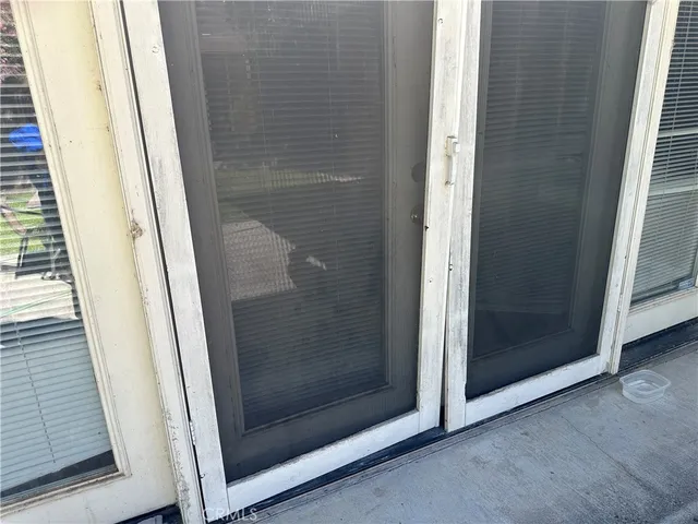 a bathroom with a glass door