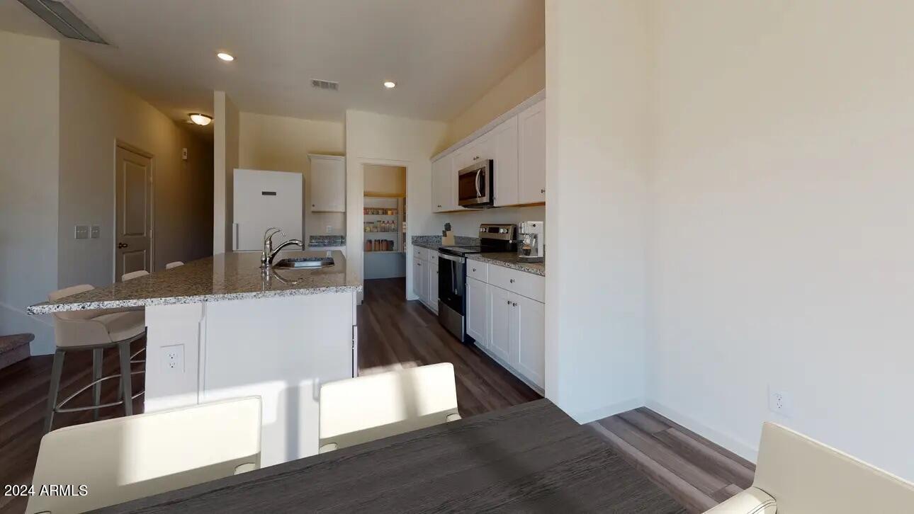 47664 West Old Timer Road Maricopa, AZ 85139 - Photo 12 of 20 Spectra - Dinning-Kitchen