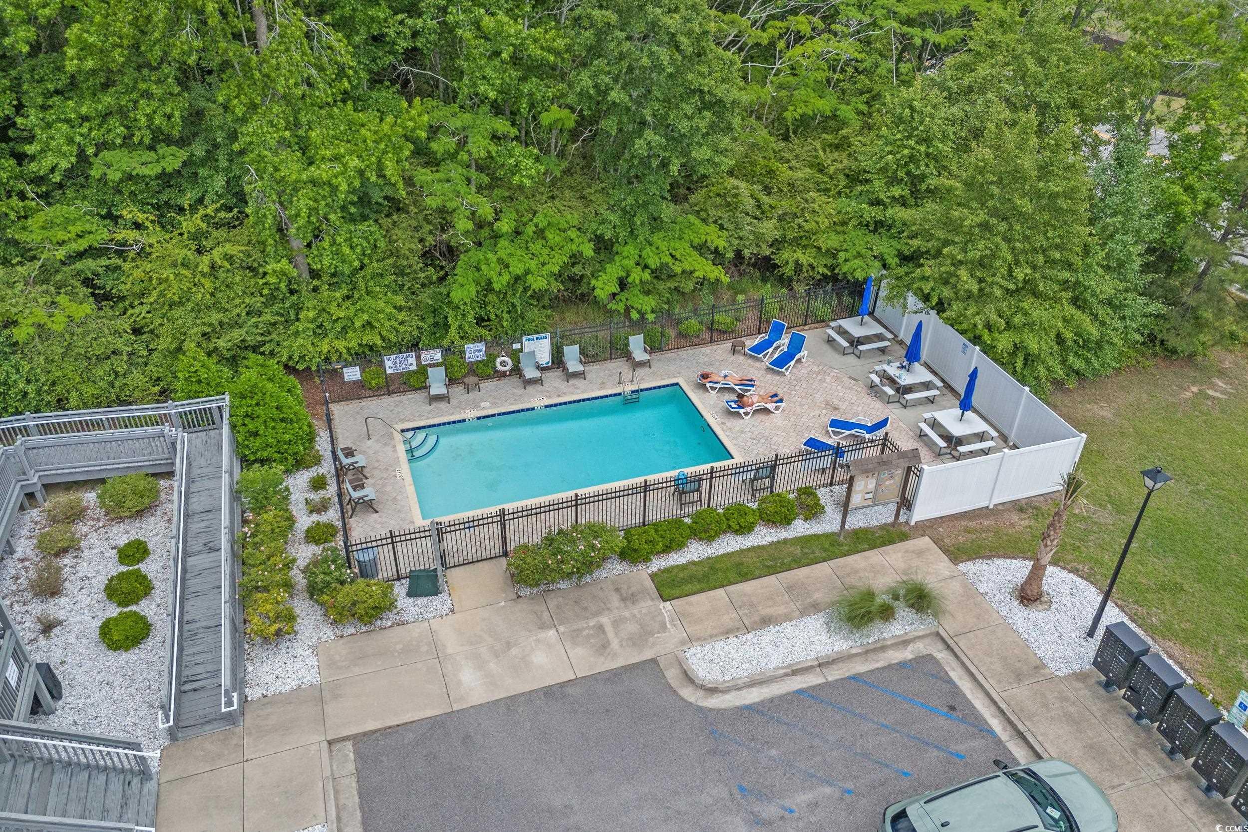 517 Mossbank Loop Longs, SC 29568 - Photo 34 of 40 Aerial view of a pool area