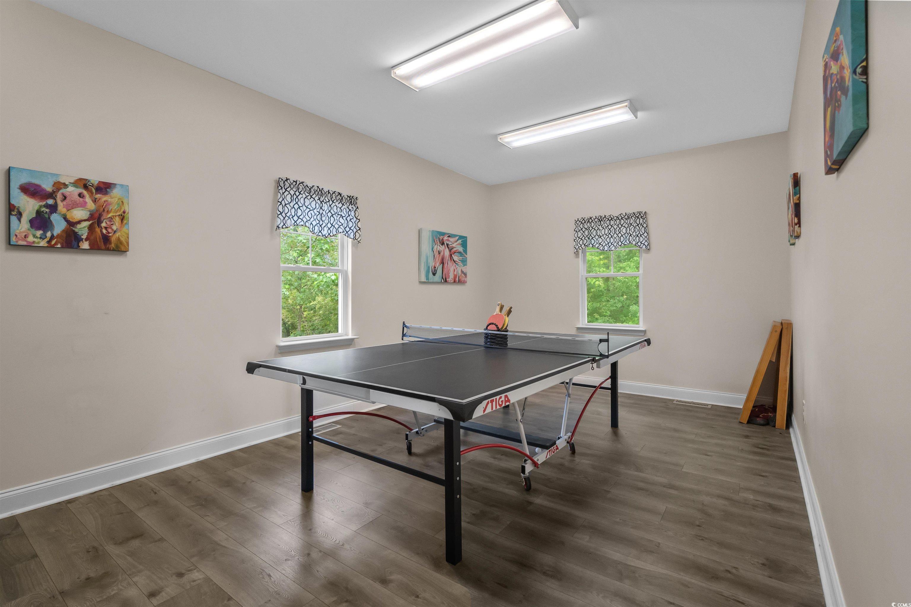 517 Mossbank Loop Longs, SC 29568 - Photo 37 of 40 Game room with wood finished floors and plenty of natural light