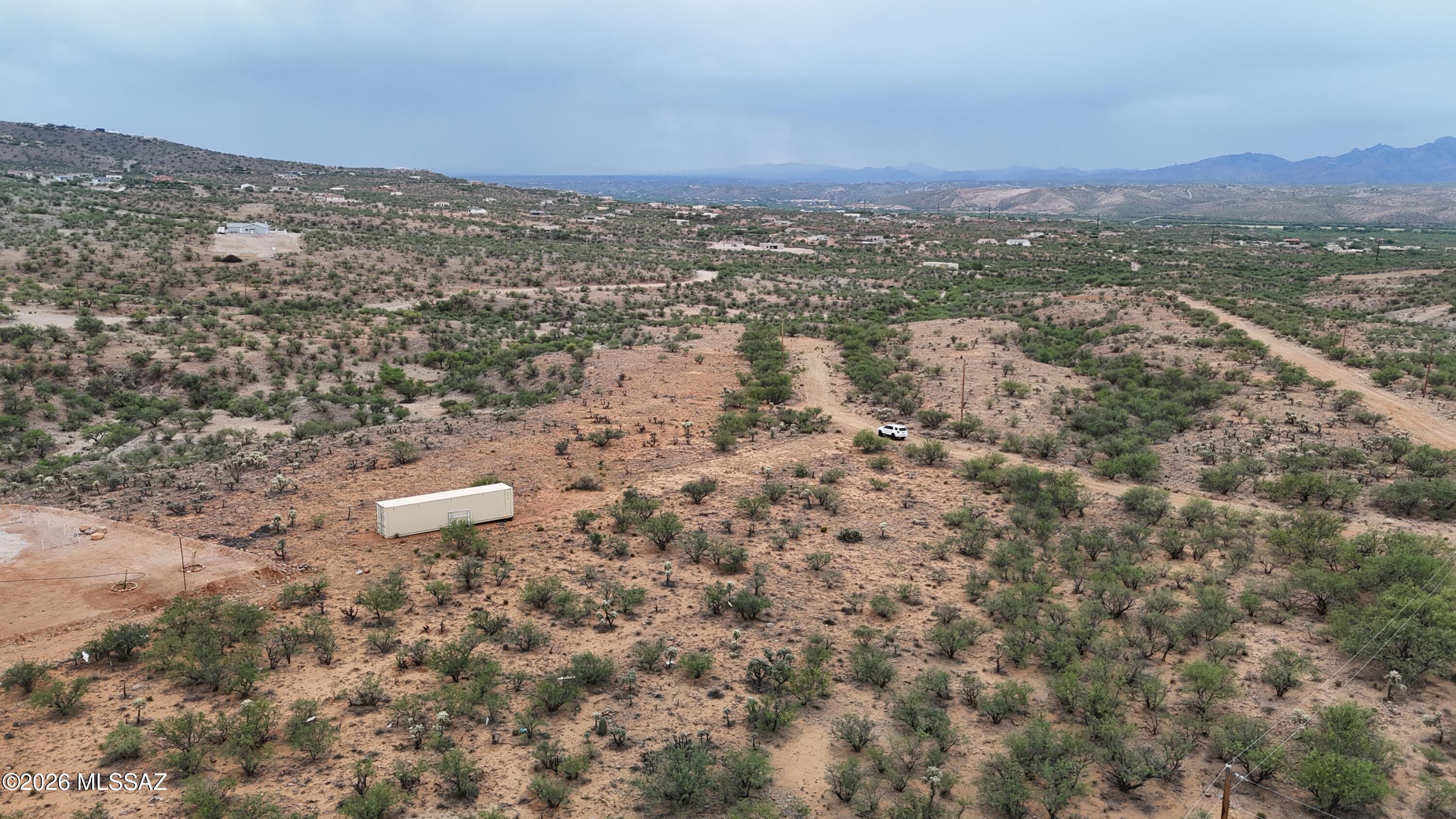 203 Loza Court, Unit 71 Rio Rico, AZ 85648 - Photo 8 of 11 a view of a city with mountain