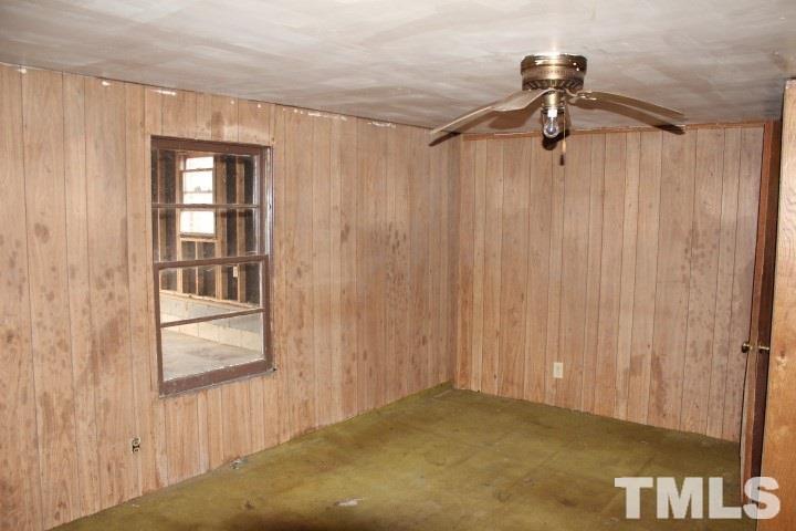 271 Boston Road Roxboro, NC 27573 - Photo 4 of 13 a view of a room with a wooden door